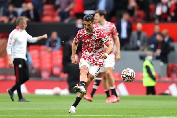 Cristiano Ronaldo of Manchester United shoots as he warms up prior to the Premier League match between Manchester United and Newcastle United at Old...