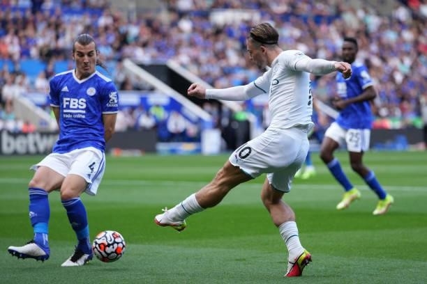 Jack Grealish of Manchester City shoots whilst under pressure from Caglar Soyuncu of Leicester City during the Premier League match between Leicester...