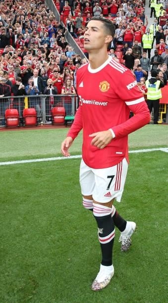 Cristiano Ronaldo of Manchester United walks out ahead of the Premier League match between Manchester United and Newcastle United at Old Trafford on...