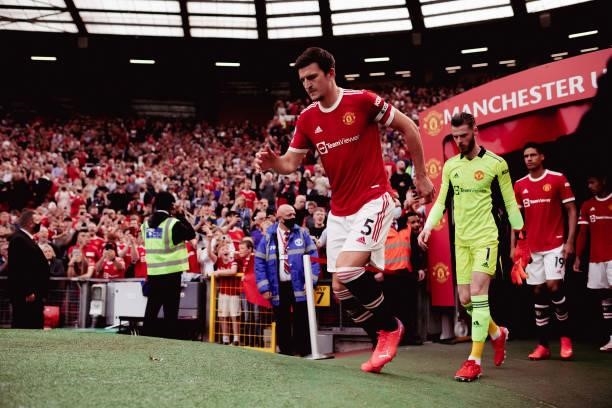 Harry Maguire of Manchester United walks out ahead of the Premier League match between Manchester United and Newcastle United at Old Trafford on...