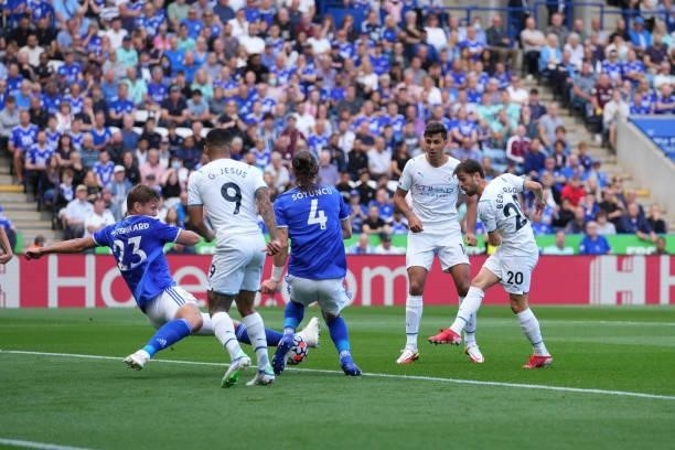 Bernardo Silva of Manchester City shoots during the Premier League match between Leicester City and Manchester City at The King Power Stadium on...
