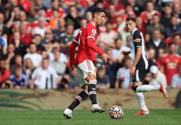 Cristiano Ronaldo of Manchester United controls the ball during the Premier League match between Manchester United and Newcastle United at Old...