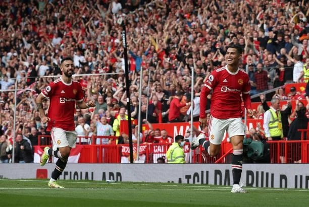Cristiano Ronaldo of Manchester United celebrates scoring their first goal during the Premier League match between Manchester United and Newcastle...
