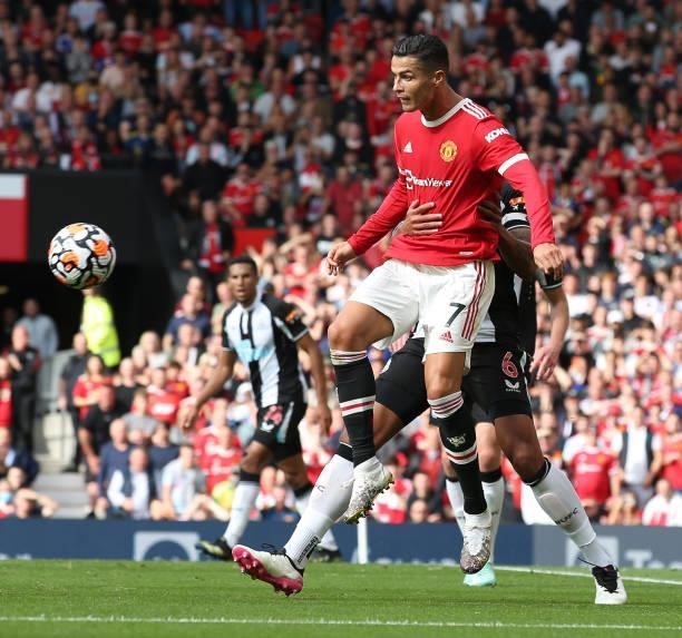 Cristiano Ronaldo of Manchester United in action with Jamaal Lascelles of Newcastle United during the Premier League match between Manchester United...
