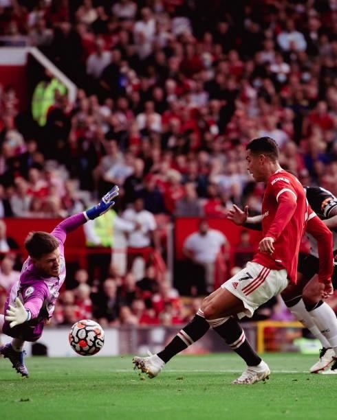 Cristiano Ronaldo of Manchester United scores their first goal during the Premier League match between Manchester United and Newcastle United at Old...