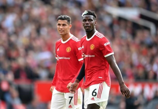 Cristiano Ronaldo and Paul Pogba of Manchester United look on during the Premier League match between Manchester United and Newcastle United at Old...