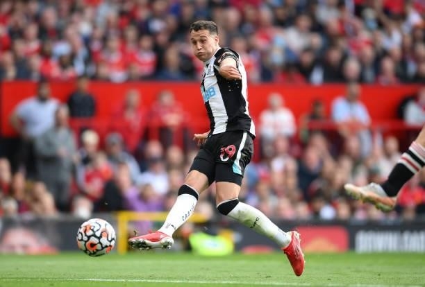 Javier Manquillo of Newcastle Uited scores their side's first goal during the Premier League match between Manchester United and Newcastle United at...