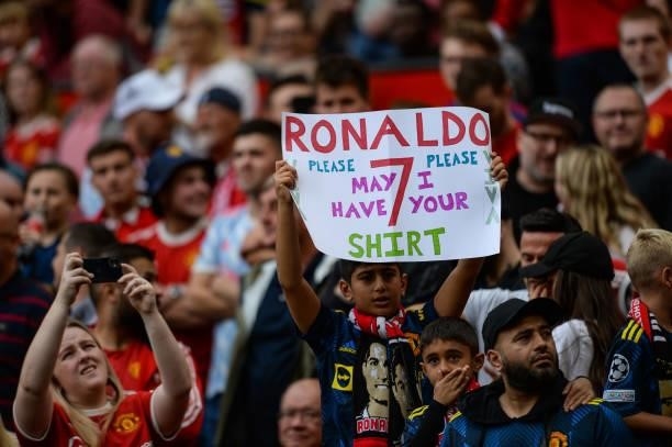 Fan with a Ronaldo sign during the Premier League match between Manchester United and Newcastle United at Old Trafford on September 11, 2021 in...