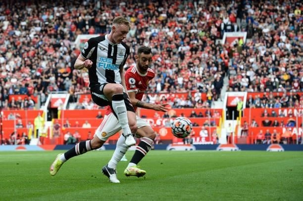 Sean Longstaff of Newcastle United FC passes the ball during the Premier League match between Manchester United and Newcastle United at Old Trafford...
