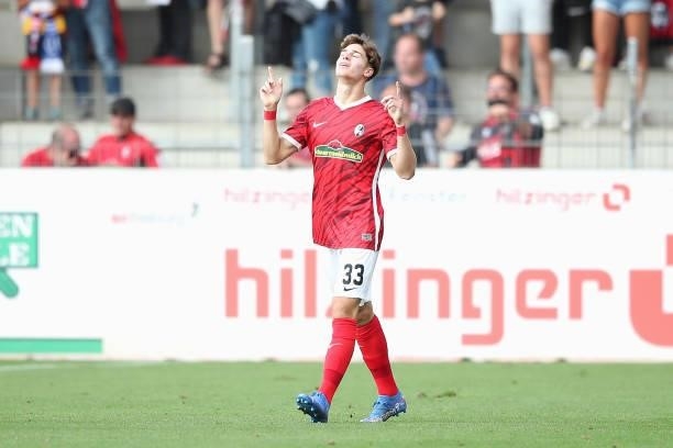 Noah Weisshaupt of SC Freiburg celebrates after scoring their side's first goal during the Bundesliga match between Sport-Club Freiburg and 1. FC...