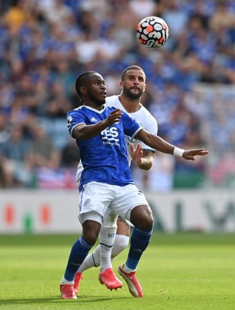 Ademola Lookman of Leicester City battles for possession with Kyle Walker of Manchester City during the Premier League match between Leicester City...