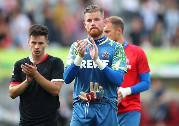 Anthony Modeste of 1.FC Koeln applauds the fans after the Bundesliga match between Sport-Club Freiburg and 1. FC Köln at SC-Stadion on September 11,...
