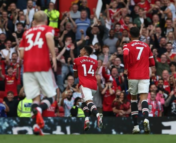 Jesse Lingard of Manchester United celebrates scoring their fouth goal during the Premier League match between Manchester United and Newcastle United...