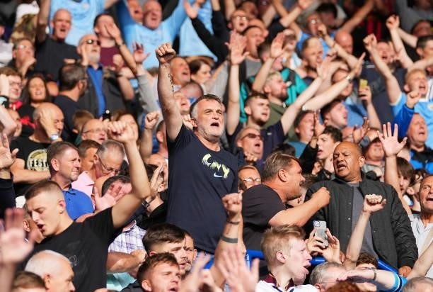 Fans of Manchester City show their support during the Premier League match between Leicester City and Manchester City at The King Power Stadium on...