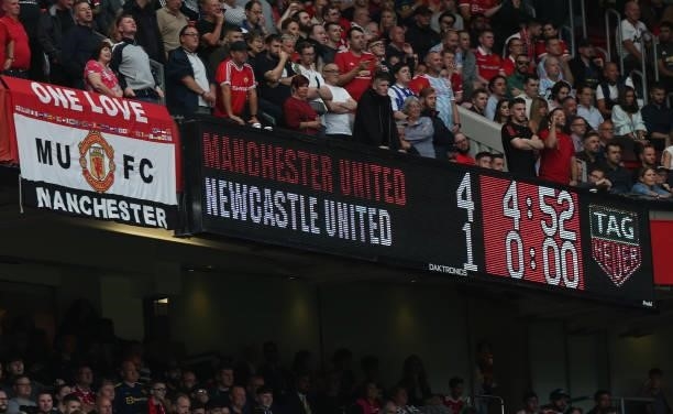 The Old Trafford scoreboard shows the final score during the Premier League match between Manchester United and Newcastle United at Old Trafford on...
