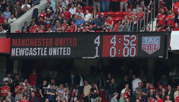 The Old Trafford scoreboard shows the final score during the Premier League match between Manchester United and Newcastle United at Old Trafford on...
