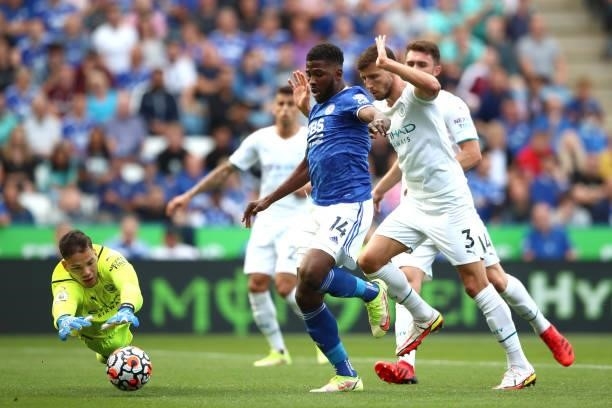 Kelechi Iheanacho of Leicester City has a shot saved by Ederson of Manchester City during the Premier League match between Leicester City and...