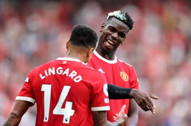 Jesse Lingard of Manchester United celebrates with Paul Pogba after scoring their side's fourth goal during the Premier League match between...