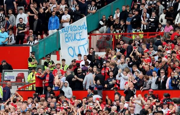 Banner with 'Bruce Out' is seen inside the ground during the Premier League match between Manchester United and Newcastle United at Old Trafford on...