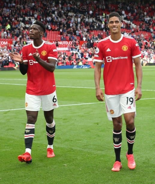 Paul Pogba and Raphael Varane of Manchester United walk off after the Premier League match between Manchester United and Newcastle United at Old...