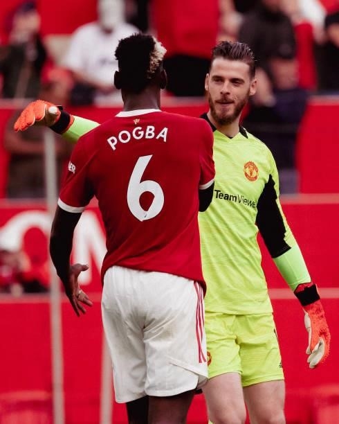 Paul Pogba and David de Gea of Manchester United walks off after the Premier League match between Manchester United and Newcastle United at Old...