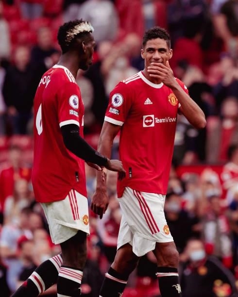 Paul Pogba and Raphael Varane of Manchester United walks off after the Premier League match between Manchester United and Newcastle United at Old...