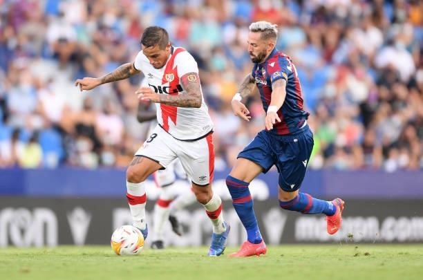 Oscar Trejo of Rayo Vallecano battles for possession with Jose Luis Morales of Levante during the LaLiga Santander match between Levante UD and Rayo...