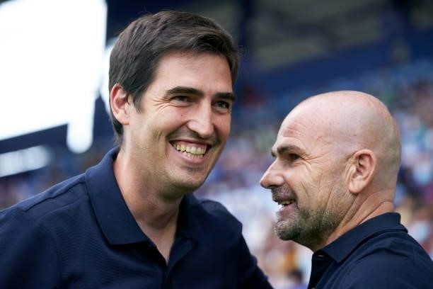 Paco Lopez, Manager of Levante UD speaks with Andoni Iraola, Manager of Rayo Vallecano prior to the La Liga Santander match between Levante UD and...
