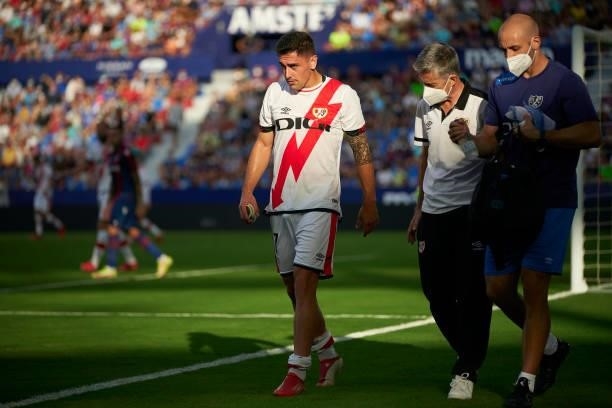 Martin Merquelanz of Rayo Vallecano leaves the pitch as he is substituted off due to injury during the La Liga Santander match between Levante UD and...