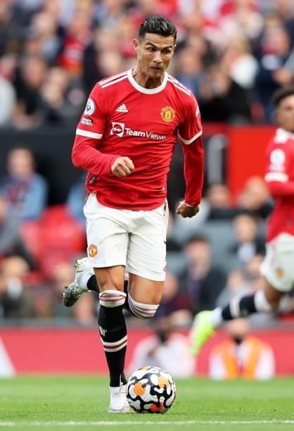 Cristiano Ronaldo of Manchester United controls the ball during the Premier League match between Manchester United and Newcastle United at Old...