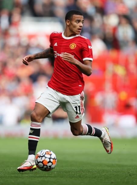 Mason Greenwood of Manchester United runs with the ball during the Premier League match between Manchester United and Newcastle United at Old...