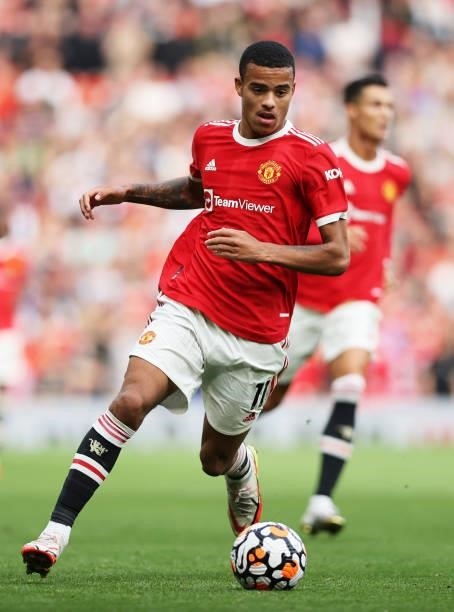Mason Greenwood of Manchester United runs with the ball during the Premier League match between Manchester United and Newcastle United at Old...