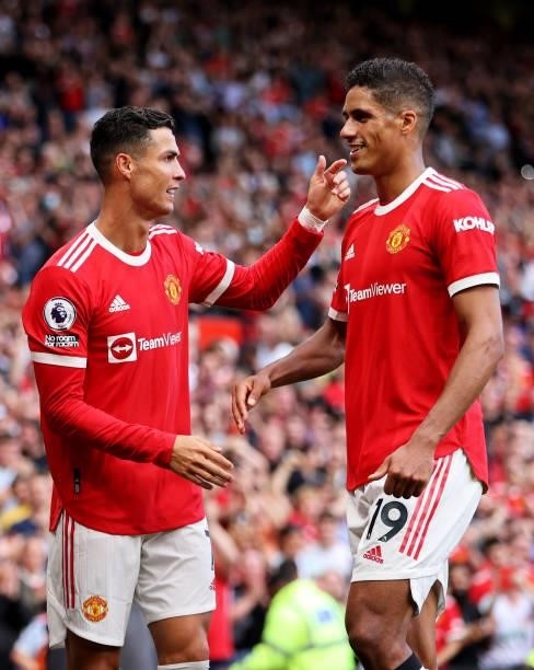 Cristiano Ronaldo of Manchester United with team mate Raphael Varane during the Premier League match between Manchester United and Newcastle United...