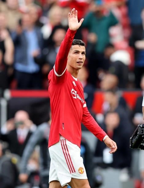 Cristiano Ronaldo waves to the crowd after the final whistle of the Premier League match between Manchester United and Newcastle United at Old...