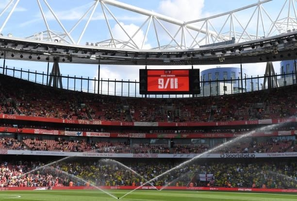 Arsenal remembers the victims of 9/11 before the Premier League match between Arsenal and Norwich City at Emirates Stadium on September 11, 2021 in...
