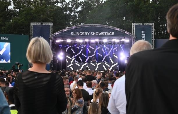 Spectators watch Clean Bandit perform during The BMW PGA Championship at Wentworth Golf Club on September 11, 2021 in Virginia Water, United Kingdom.