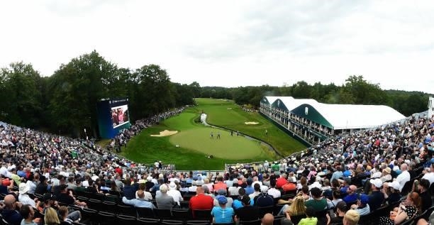 Spectators watch play on the 18th green during The BMW PGA Championship at Wentworth Golf Club on September 11, 2021 in Virginia Water, United...