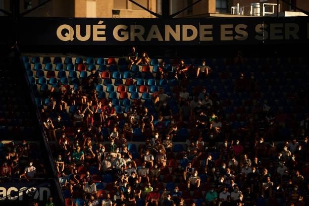 Fans of Levante UD during the LaLiga Santander match between Levante UD and Rayo Vallecano at Ciutat de Valencia Stadium on September 11, 2021 in...