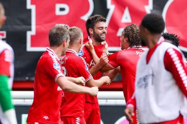 Robin Propper of FC Twente celebrates after scoring his sides first goal with Jesse Bosch of FC Twente and Giovanni Troupee of FC Twente during the...