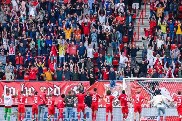 Players of FC Twente celebrating the win with the fans and supporters during the Dutch Eredivisie match between FC Twente and FC Utrecht at Grolsch...