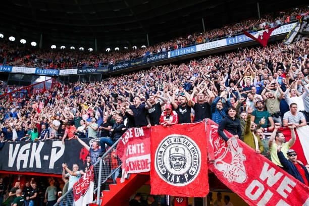 Supporters and fans of FC Twente during the Dutch Eredivisie match between FC Twente and FC Utrecht at Grolsch Veste on September 11, 2021 in...