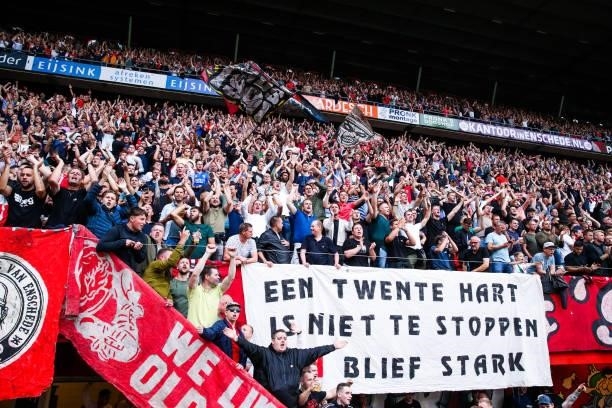 Supporters and fans of FC Twente during the Dutch Eredivisie match between FC Twente and FC Utrecht at Grolsch Veste on September 11, 2021 in...