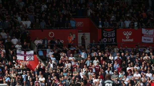Southampton supporters watch the action during the Premier League match between Southampton and West Ham United at St Mary's Stadium on September 11,...
