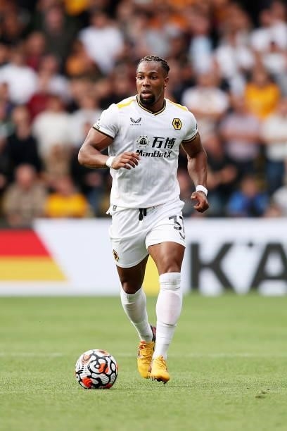 Adama Traore of Wolverhampton Wanderers runs with the ball during the Premier League match between Watford and Wolverhampton Wanderers at Vicarage...