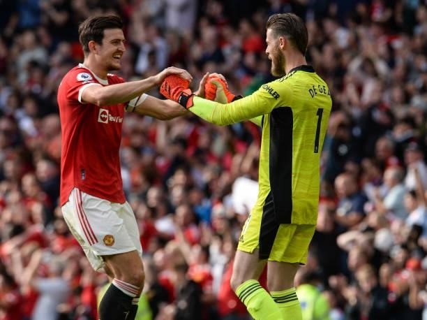 Harry Maguire of Manchester United and Manchester United Goalkeeper David DeGea celebrate after Manchester score their fourth goal during the Premier...