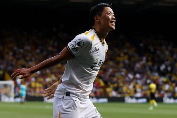 Hee-chan Hwang of Wolverhampton Wanderers celebrates after scoring his team's second goal during the Premier League match between Watford and...