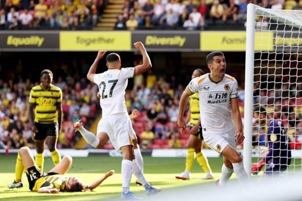 Conor Coady of Wolverhampton Wanderers celebrates his team's first goal score by Francisco Sierralta of Watford during the Premier League match...