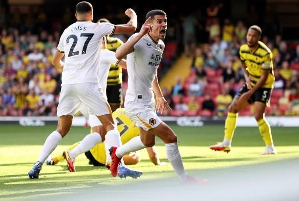 Conor Coady of Wolverhampton Wanderers celebrates his team's first goal score by Francisco Sierralta of Watford during the Premier League match...