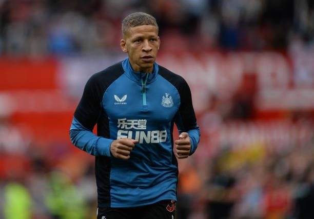 Dwight Gayle of Newcastle United FC warms up during the Premier League match between Manchester United and Newcastle United at Old Trafford on...