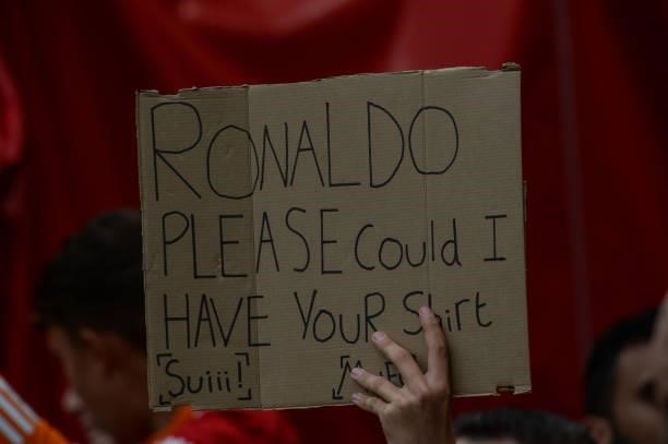 Fan holds up a sign asking for Cristiano Ronaldo of Manchester United shirt during the Premier League match between Manchester United and Newcastle...